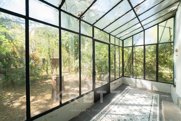 Propriété sur un terrain constructible de 3.500m² en coeur de ville