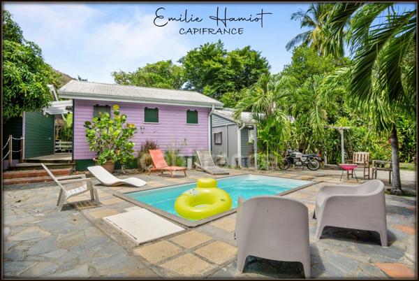 A louer sur Case Pilote - Fond Boucher - Appartement en RDC 4 pièces - jardin et piscine commune