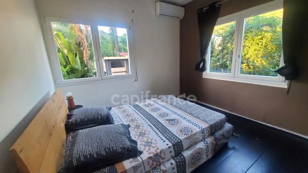 A louer sur Case Pilote - Fond Boucher - Appartement en RDC 4 pièces - jardin et piscine commune