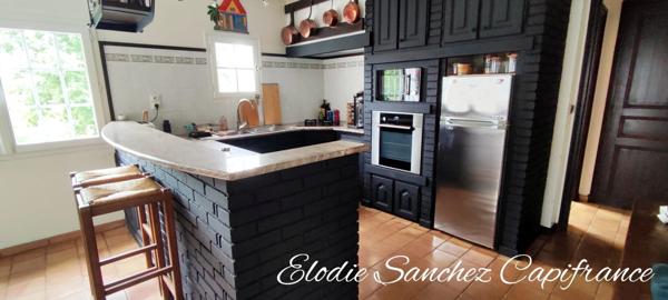 A 15 minutes de Tarbes, maison traditionnelle 10 pièces , 5 chambres, avec parc et piscine.