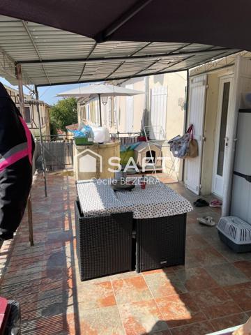 Maison de ville comprenant deux appartements