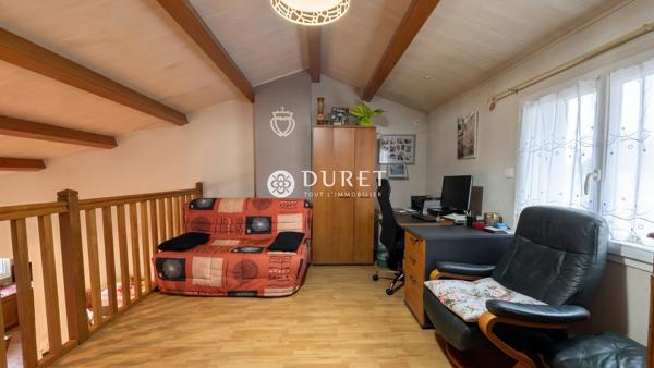 Plain-pied aux beaux volumes, proche du centre-ville