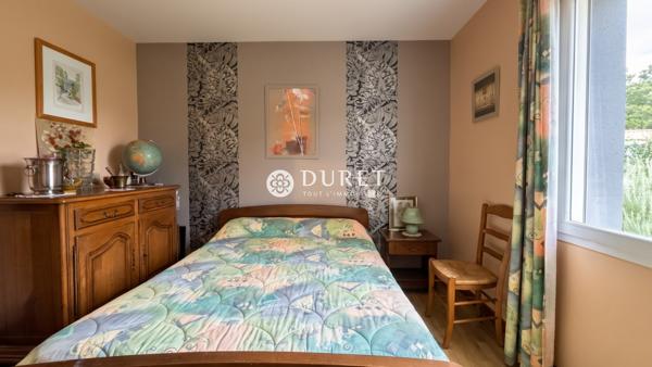 Plain-pied aux beaux volumes, proche du centre-ville
