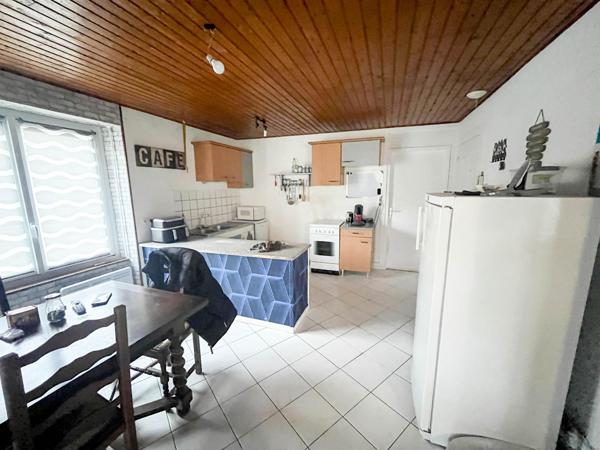 Immeuble - 6 appartements et 1 local commercial