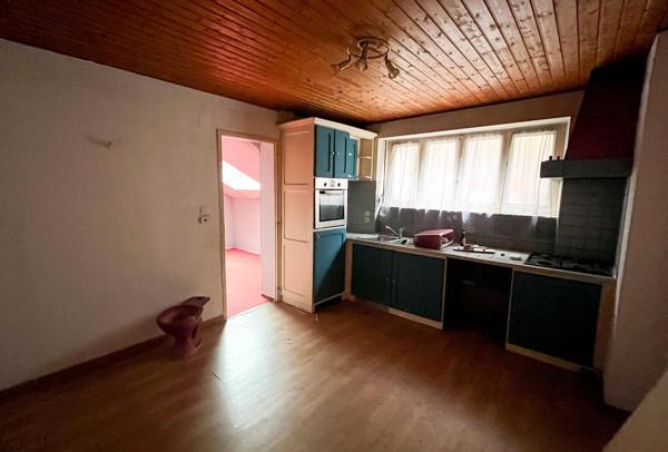 Immeuble - 6 appartements et 1 local commercial