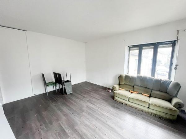 Immeuble - 6 appartements et 1 local commercial