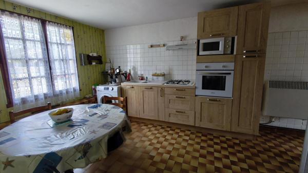 Maison de plain-pied proche commodités