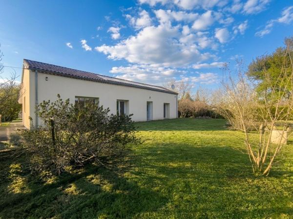 Séjour lumineux et grand terrain constructible