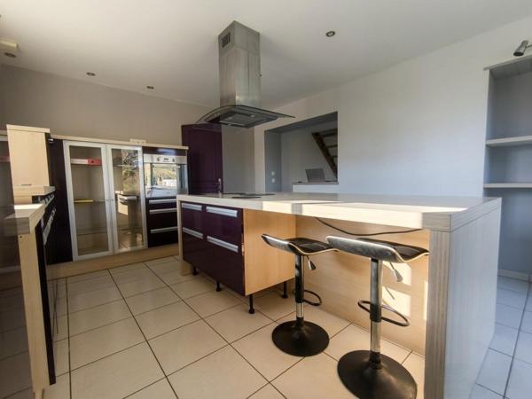 Séjour lumineux et grand terrain constructible