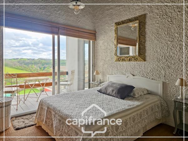 Maison d'architecte en pierre 200m², vue dégagée plein sud, piscine,lumineuse ,commodités à pied, 25min Agen, 20 min Golfech