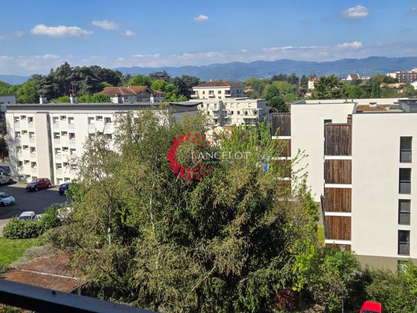 Appartement 6 P de 115 m² avec cave, garage et parking privatif