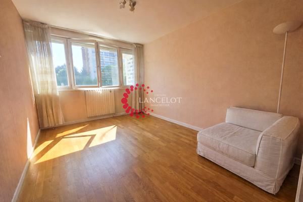 Appartement 6 P de 115 m² avec cave, garage et parking privatif