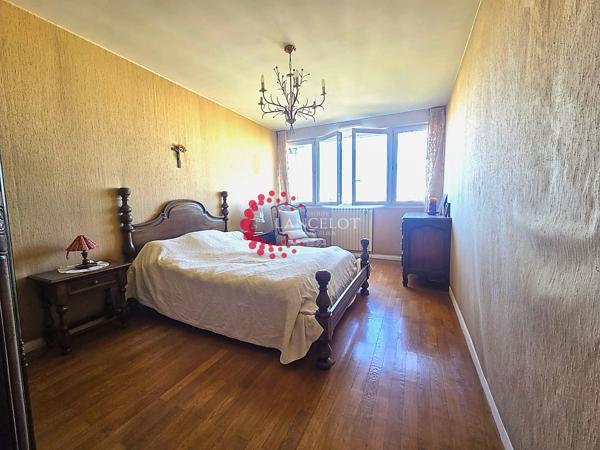 Appartement 6 P de 115 m² avec cave, garage et parking privatif