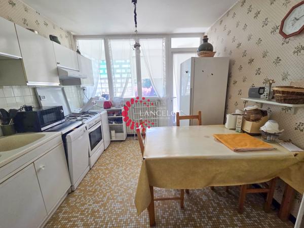 Appartement 6 P de 115 m² avec cave, garage et parking privatif