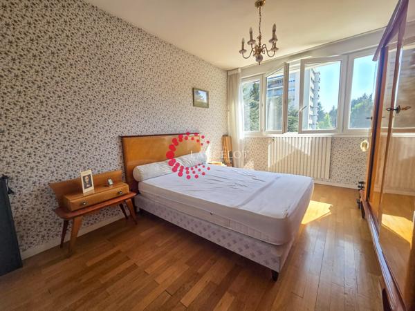 Appartement 6 P de 115 m² avec cave, garage et parking privatif