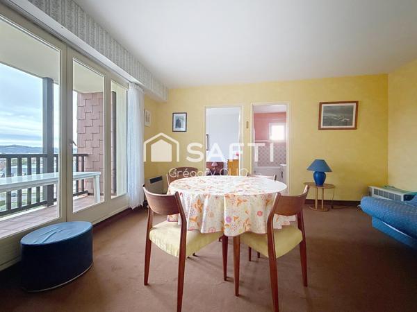 Apparemment 2 pièces avec place de parking et cave