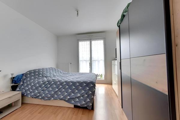 Appartement 2 pièces 44 m2 avec jardin + box + parking + cave en rdc