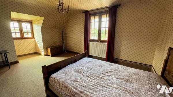 Dans le bourg de MARIGNY, pavillon sur sous-sol de 135,5m² habitables sur un terrain de 1 183m²