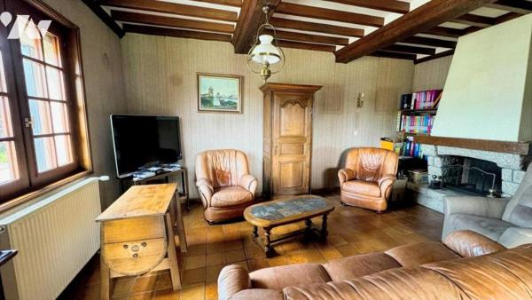 Dans le bourg de MARIGNY, pavillon sur sous-sol de 135,5m² habitables sur un terrain de 1 183m²