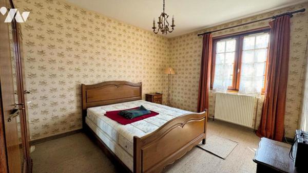 Dans le bourg de MARIGNY, pavillon sur sous-sol de 135,5m² habitables sur un terrain de 1 183m²