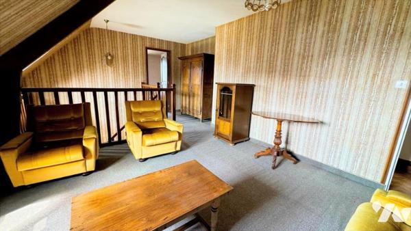 Dans le bourg de MARIGNY, pavillon sur sous-sol de 135,5m² habitables sur un terrain de 1 183m²