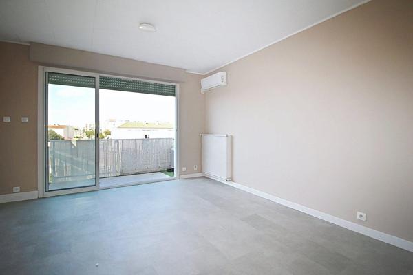 Appartement 3 pièces de 54 m2 - balcons - garage