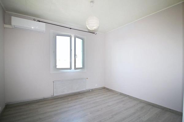 Appartement 3 pièces de 54 m2 - balcons - garage