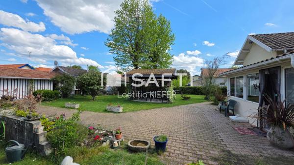2 maisons sur beau terrain paysagé