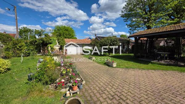 2 maisons sur beau terrain paysagé