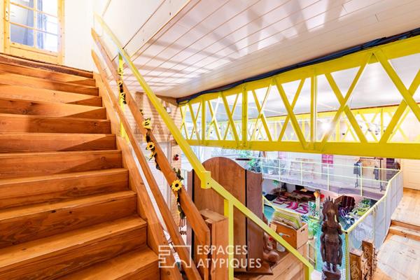 Bâtiment industriel rénové avec volumes exceptionnels et potentiel d’aménagement