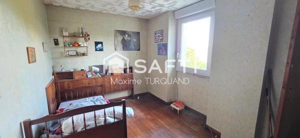 Ensemble immobilier comprenant 2 logements dont 1 loué + terrains + dépendances.