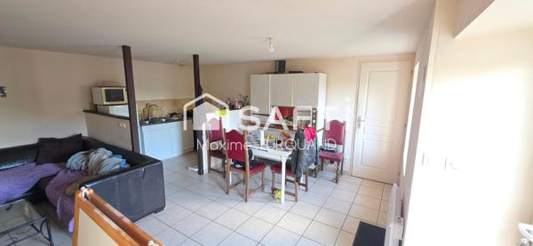 Ensemble immobilier comprenant 2 logements dont 1 loué + terrains + dépendances.