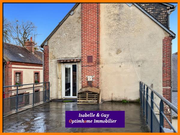 2 LOGEMENTS ET UN TERRAIN AVEC 2 BATIMENTS