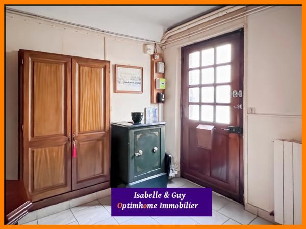 2 LOGEMENTS ET UN TERRAIN AVEC 2 BATIMENTS