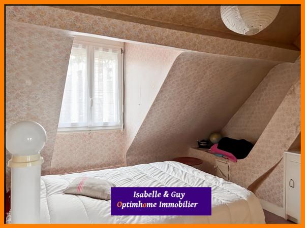 2 LOGEMENTS ET UN TERRAIN AVEC 2 BATIMENTS