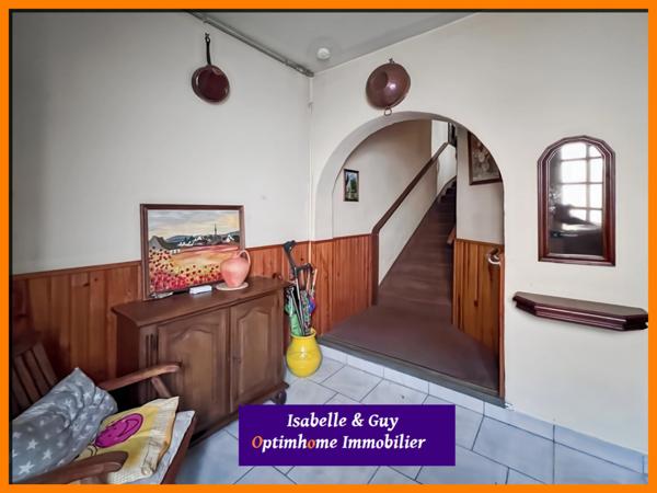 2 LOGEMENTS ET UN TERRAIN AVEC 2 BATIMENTS