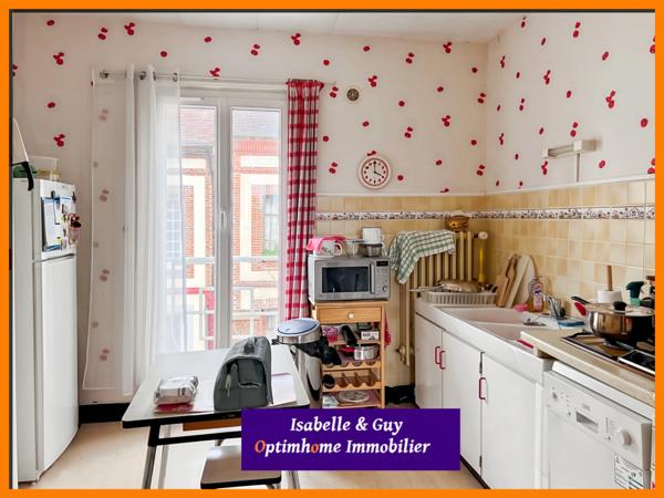 2 LOGEMENTS ET UN TERRAIN AVEC 2 BATIMENTS