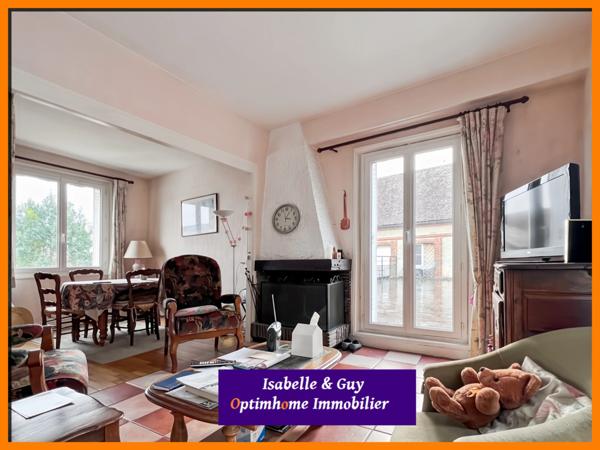 2 LOGEMENTS ET UN TERRAIN AVEC 2 BATIMENTS