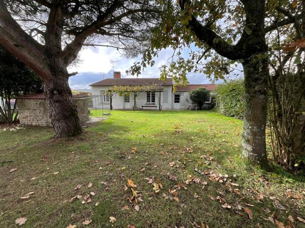 Maison de plain-pied 110m2, 3 chambres, garage, terrain divisible et constructible