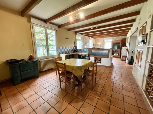 Maison de plain-pied 110m2, 3 chambres, garage, terrain divisible et constructible