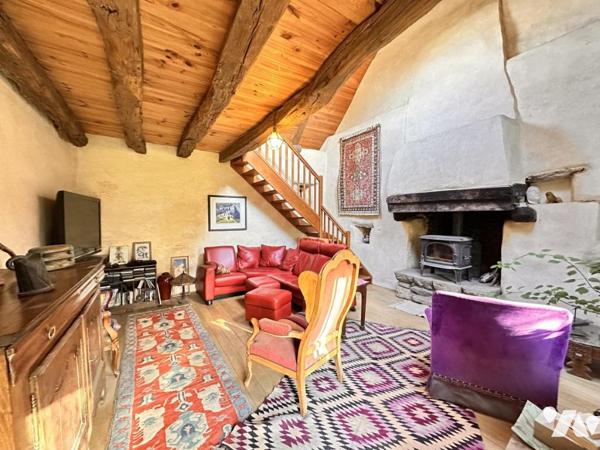 Ensemble immobilier de 360m² comprenant une maison de maître et de deux gîtes