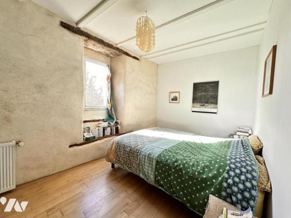 Ensemble immobilier de 360m² comprenant une maison de maître et de deux gîtes