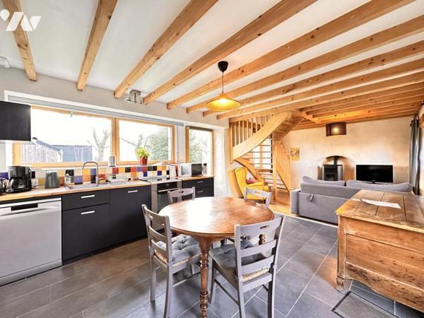 Ensemble immobilier de 360m² comprenant une maison de maître et de deux gîtes