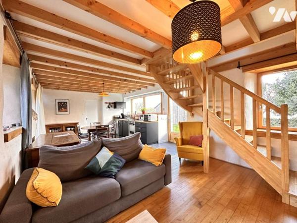 Ensemble immobilier de 360m² comprenant une maison de maître et de deux gîtes