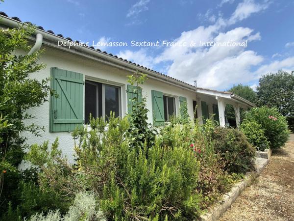 Charmante maison de plain-pied avec jardin arboré et garage, à 5kms de Duras