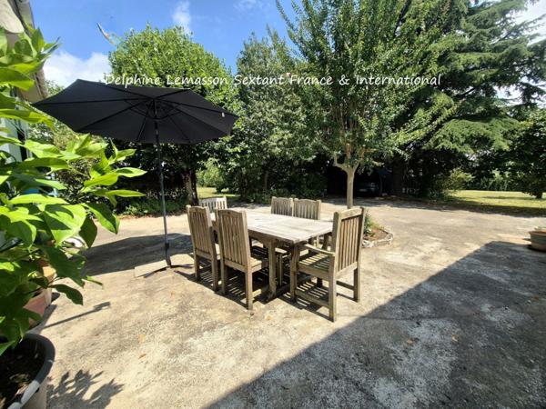 Charmante maison de plain-pied avec jardin arboré et garage, à 5kms de Duras