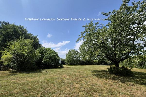 Charmante maison de plain-pied avec jardin arboré et garage, à 5kms de Duras