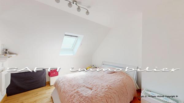 Maison contemporaine 164m2 - 5 chambres - dont un studio T2 indépendant – garage – véranda.