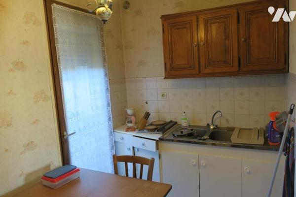 Maison T5 - Cave - Garage - Cour. 105 m² cadastré.