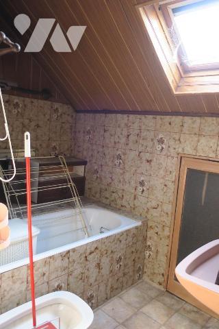 Maison T5 - Cave - Garage - Cour. 105 m² cadastré.